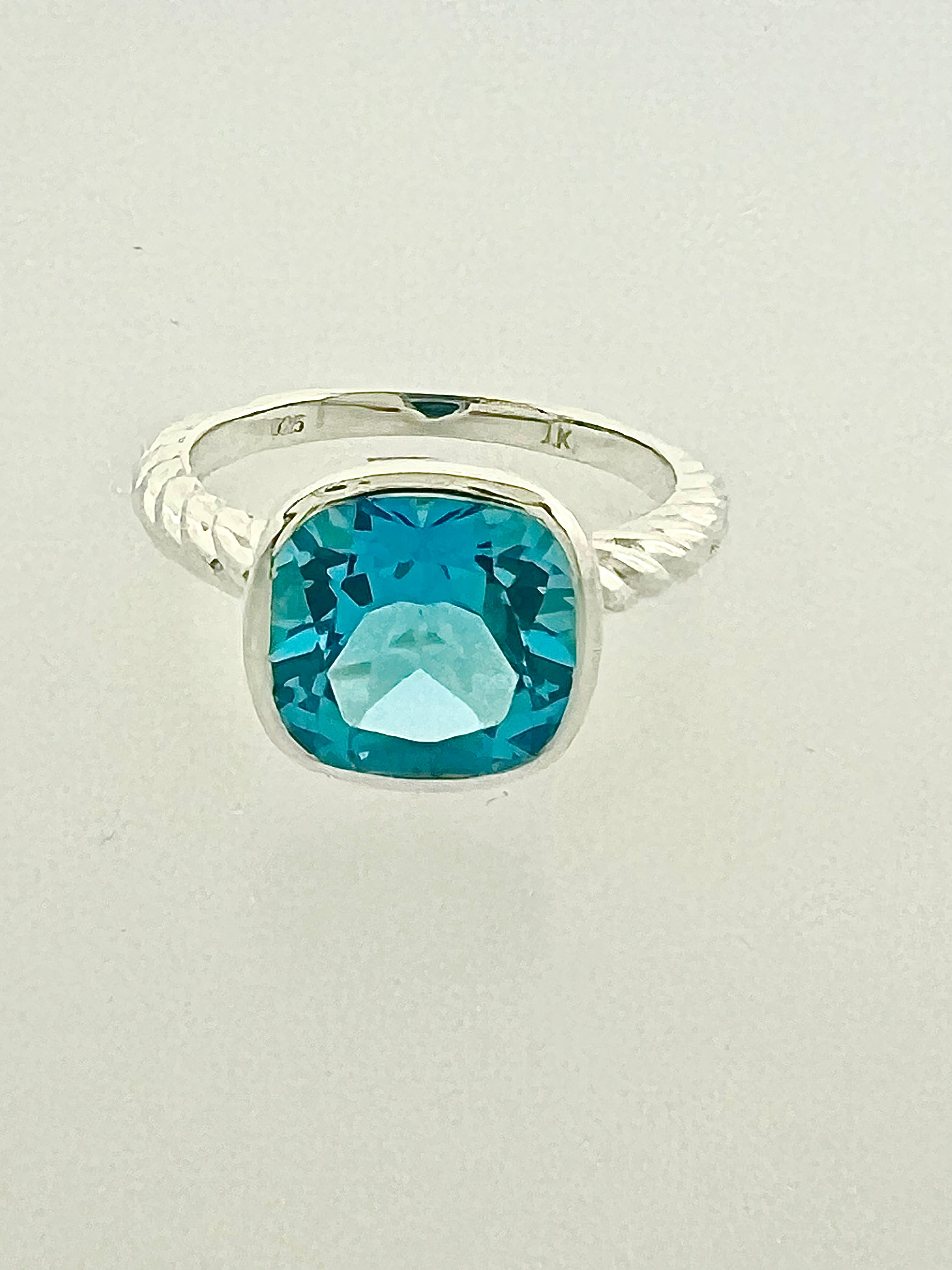 Affinity Ring with 10 x10 mm Cushion Swiss Blue Topaz – Joseph Karcher