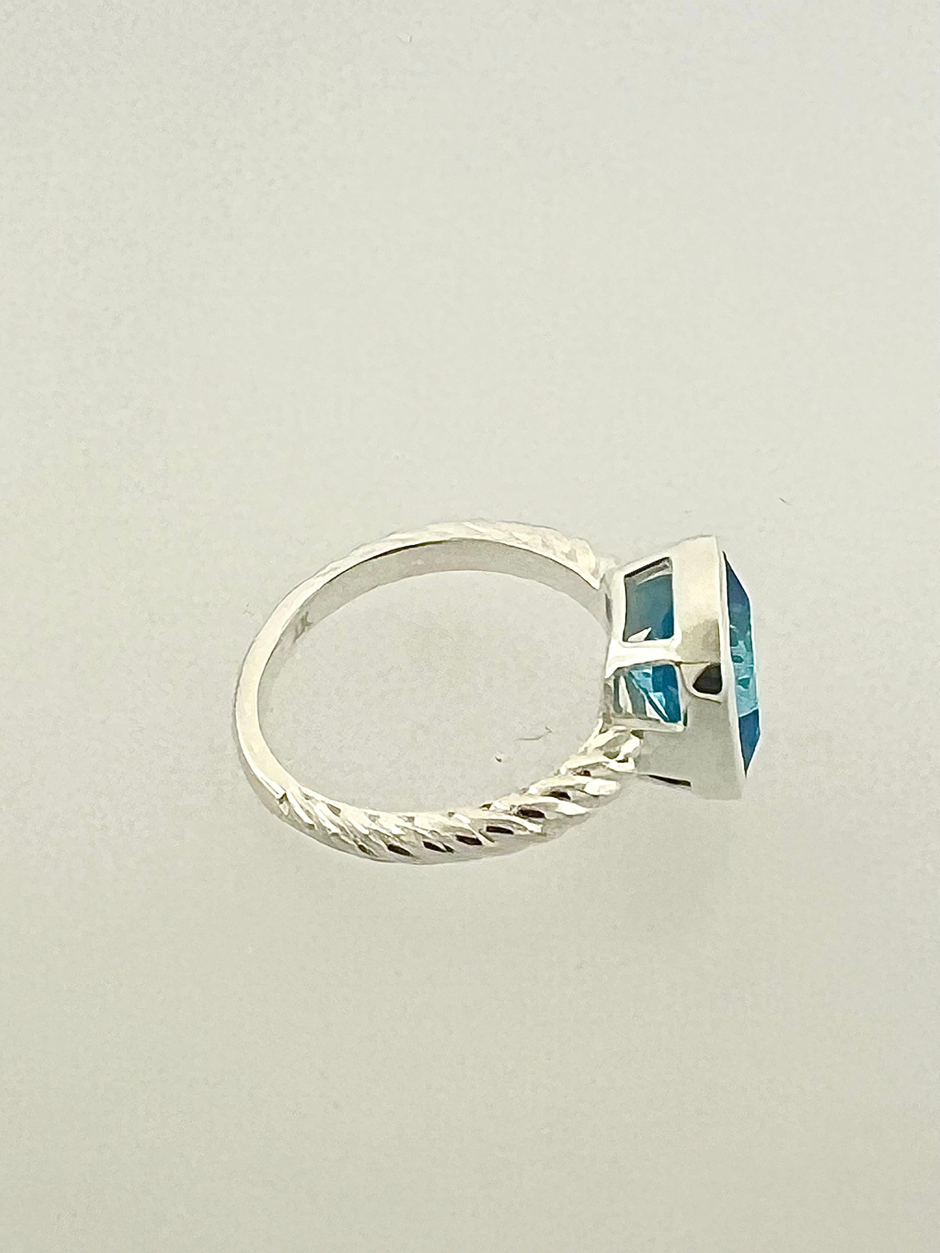Affinity Ring with 10 x10 mm Cushion Swiss Blue Topaz – Joseph Karcher